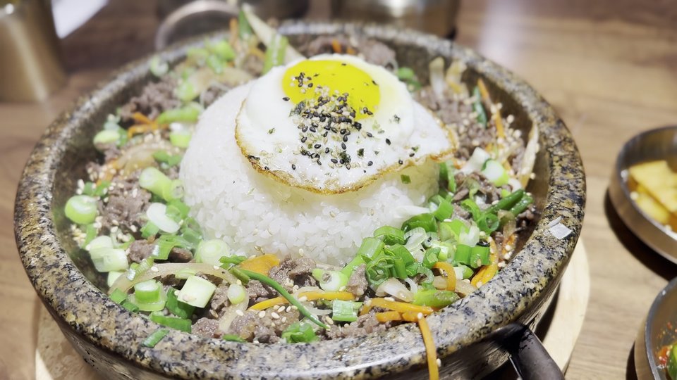 Shared dishes with rice and soup, Korean-style.